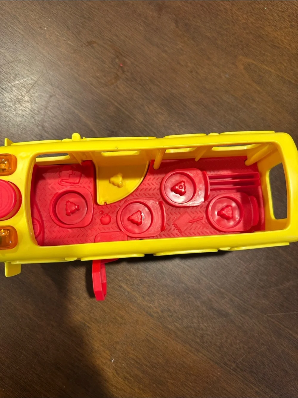 Fisher-Price Yellow and Red Smiling School Bus Toy